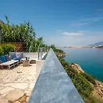 A White Cliffside Studio