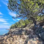 Cottage Made Of Stones And Wood With The Sea View.