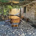 Cottage Made Of Stones And Wood With The Sea View.