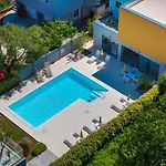 D. Marine Apartments