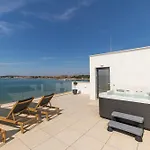 Aqua Blue By Belmont Realty