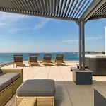 Aqua Blue By Belmont Realty