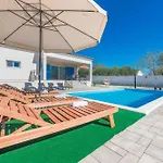 Holiday Home In Tinj 51845